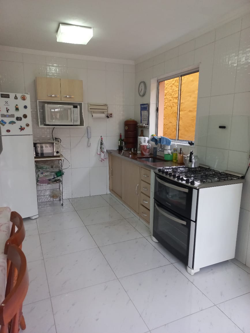 excelente sobrado com + uma casa em otima localização