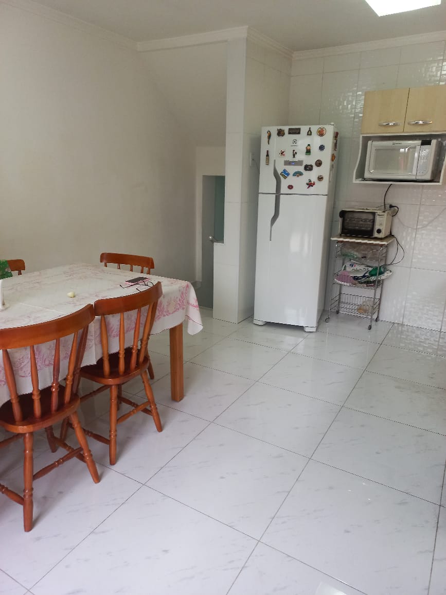 excelente sobrado com + uma casa em otima localização