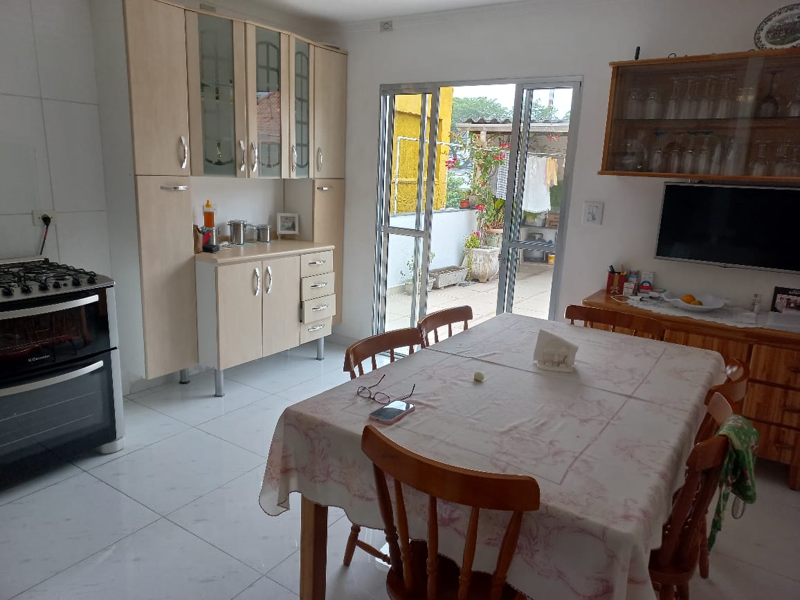 excelente sobrado com + uma casa em otima localização