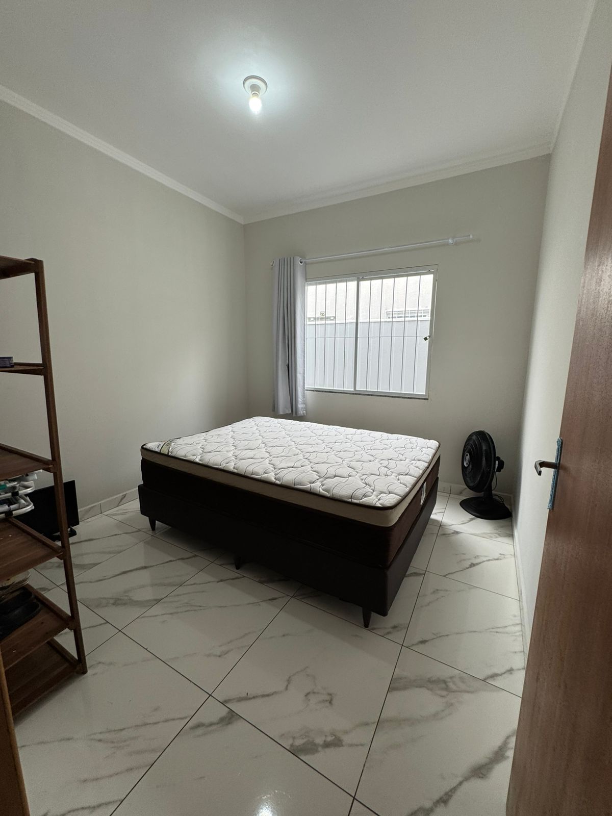 Casa geminada com amplo terreno em Itajuba