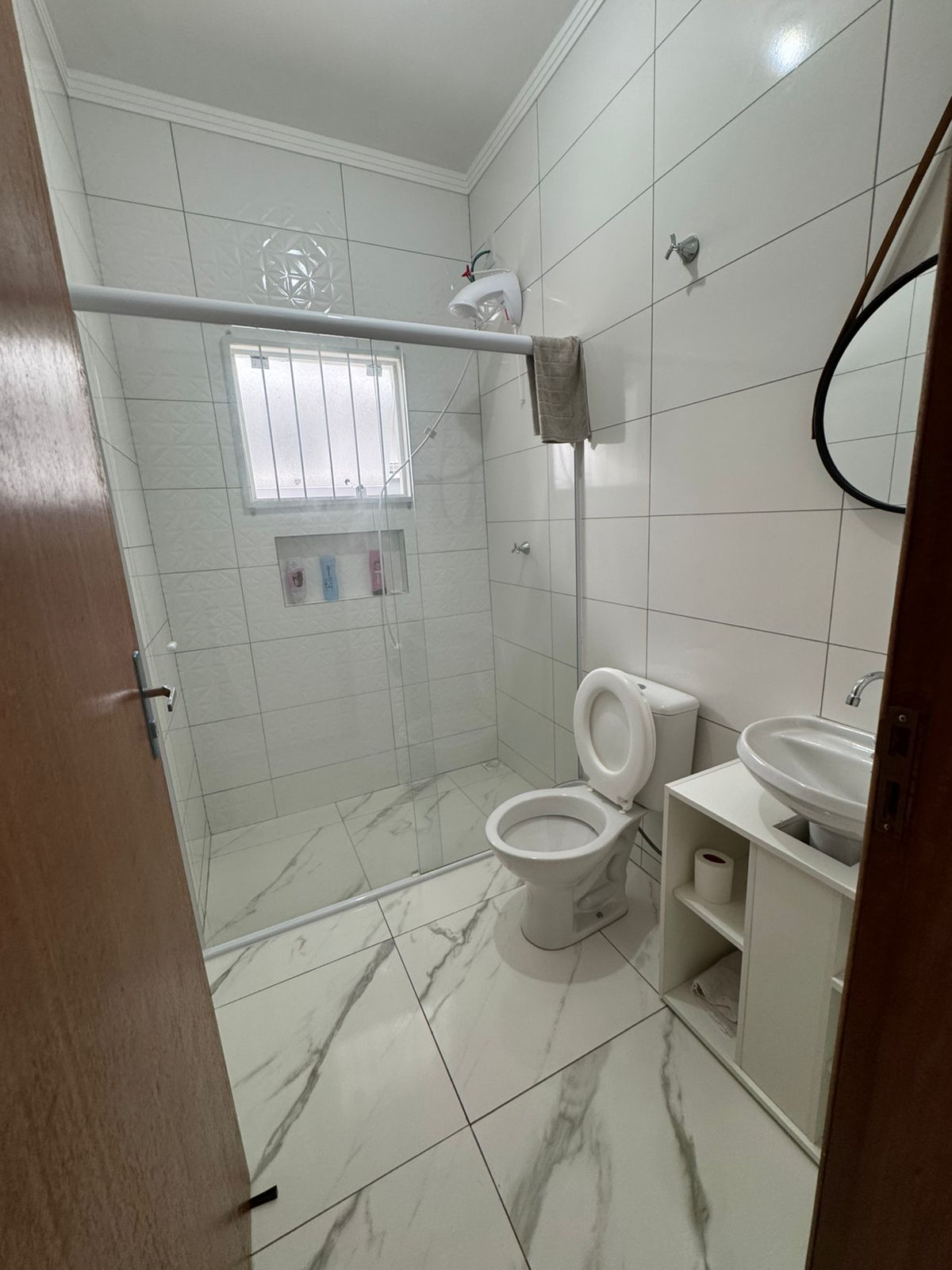 Casa geminada com amplo terreno em Itajuba
