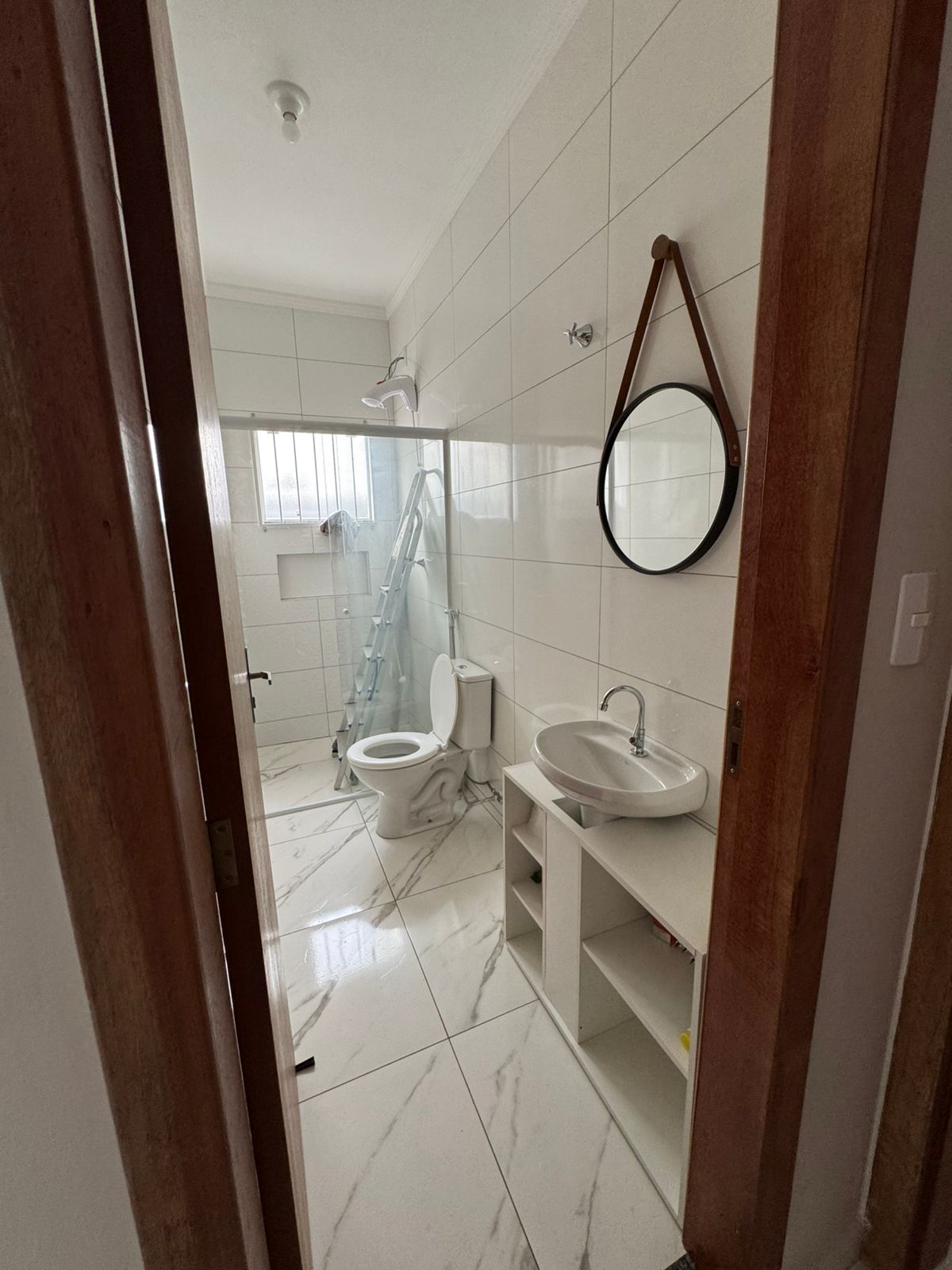 Casa geminada com amplo terreno em Itajuba