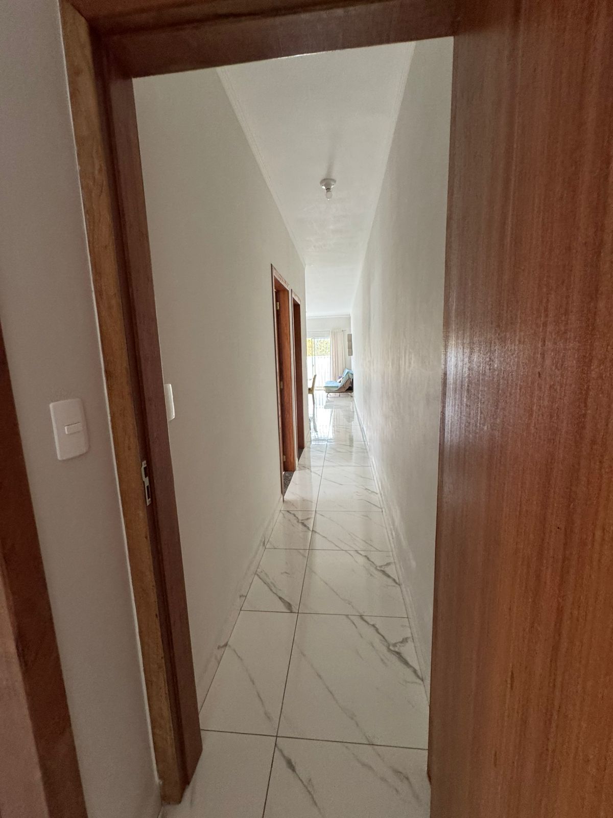 Casa geminada com amplo terreno em Itajuba