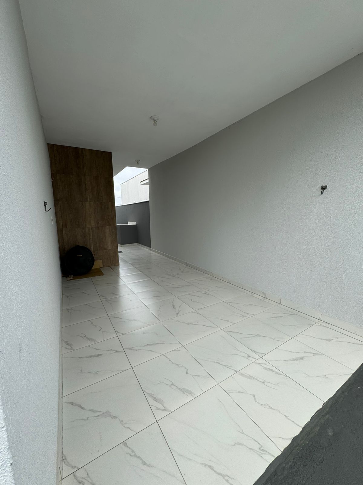 Casa geminada com amplo terreno em Itajuba