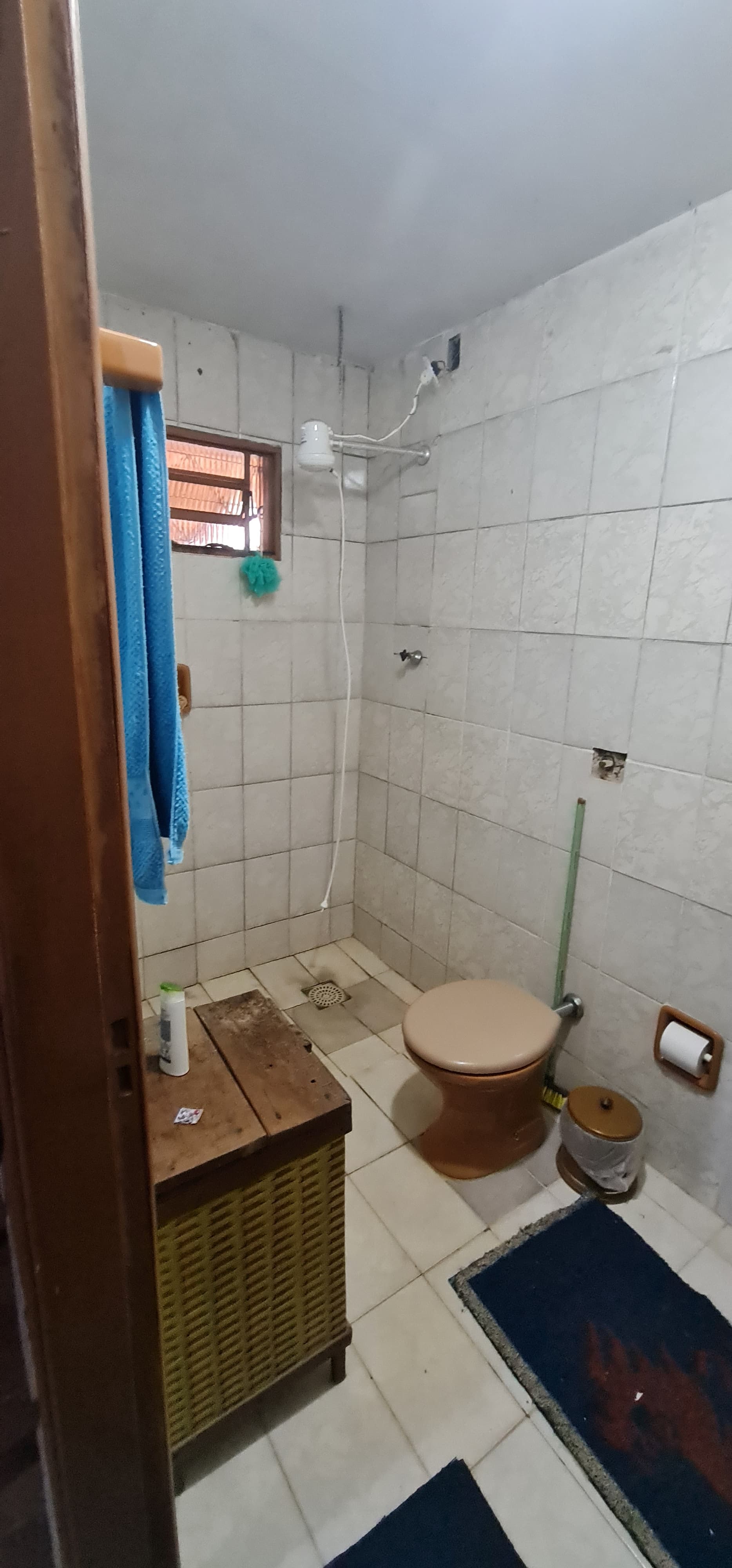 Charmosa Casa de 3 Quartos com Quintal Amplo e Suíte!
