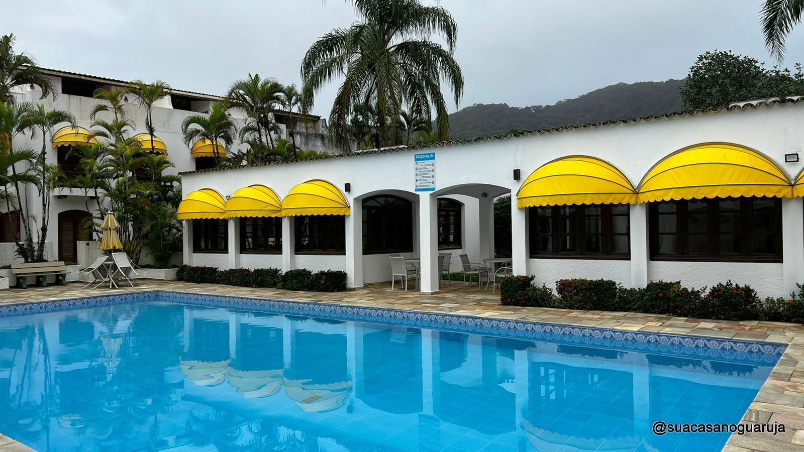 Sobrado com 4 dormitórios à venda, 184 m² por R$ 950.000,00 - Praia da Enseada - Tortugas - Guarujá/SP