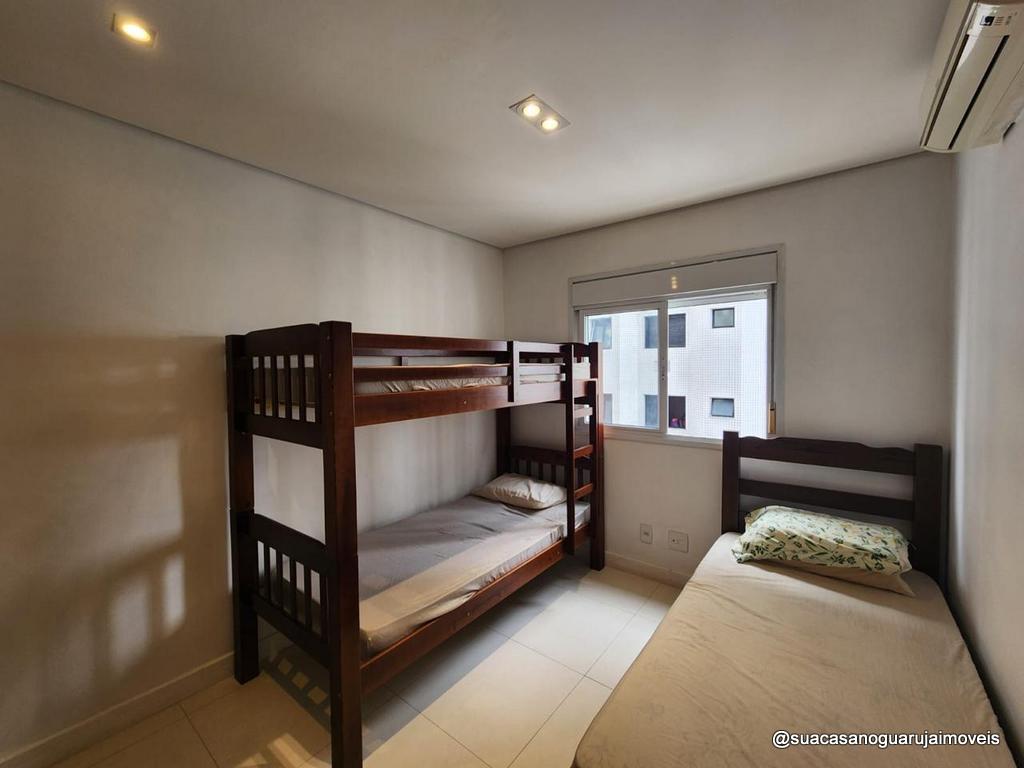 Apartamento venda 2 dormitórios 1 suíte 90m² 2 vagas Astúrias Guarujá cod R034577