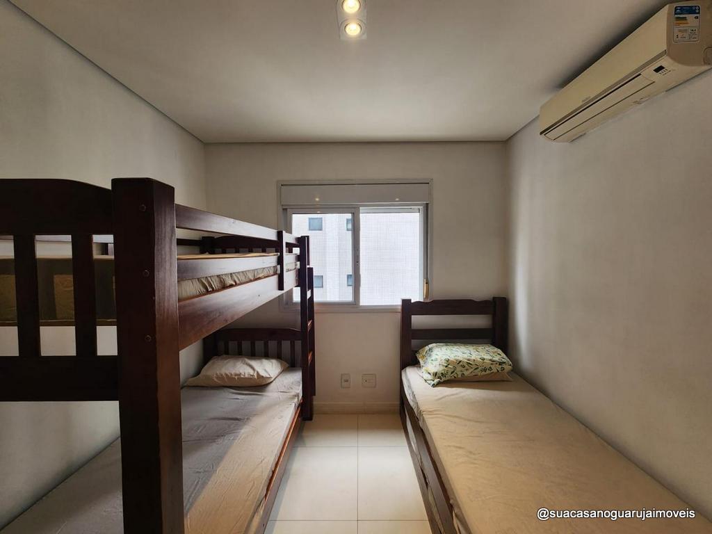 Apartamento venda 2 dormitórios 1 suíte 90m² 2 vagas Astúrias Guarujá cod R034577