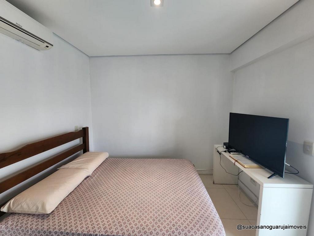 Apartamento venda 2 dormitórios 1 suíte 90m² 2 vagas Astúrias Guarujá cod R034577