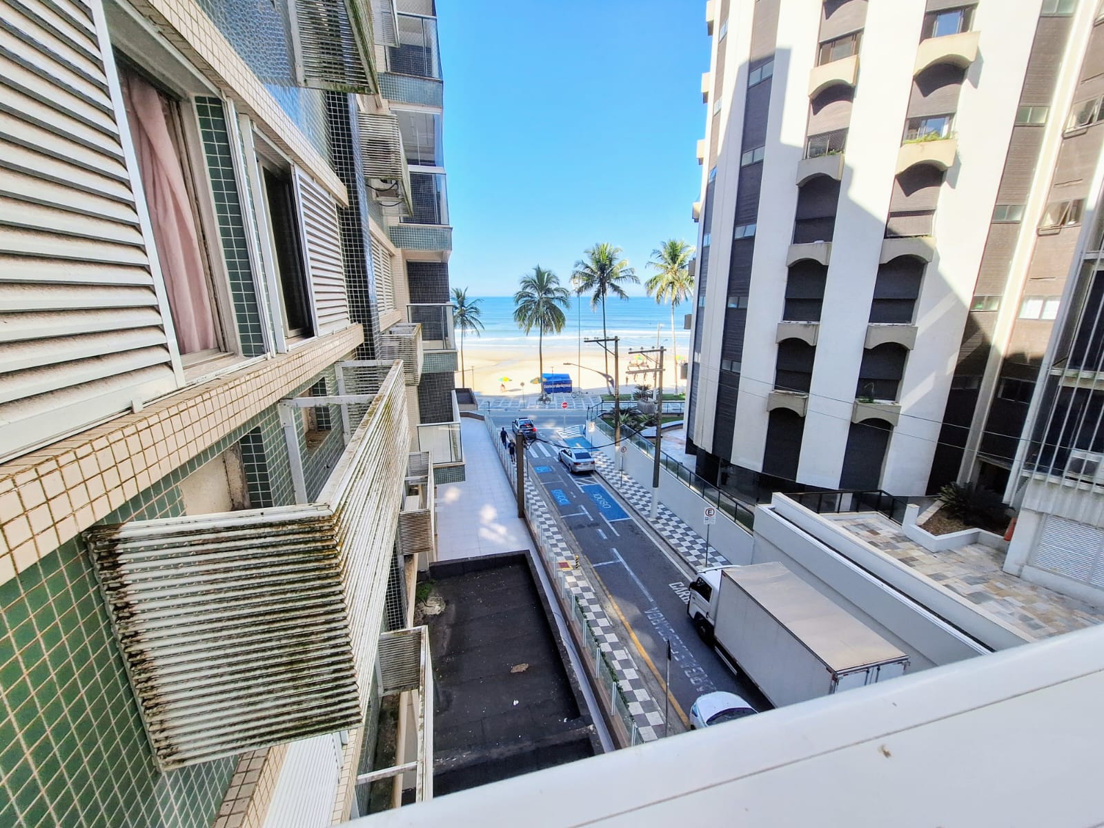 Apartamento vista lateral mar 3 dormitórios  1 vaga Astúrias - Guarujá R3307241