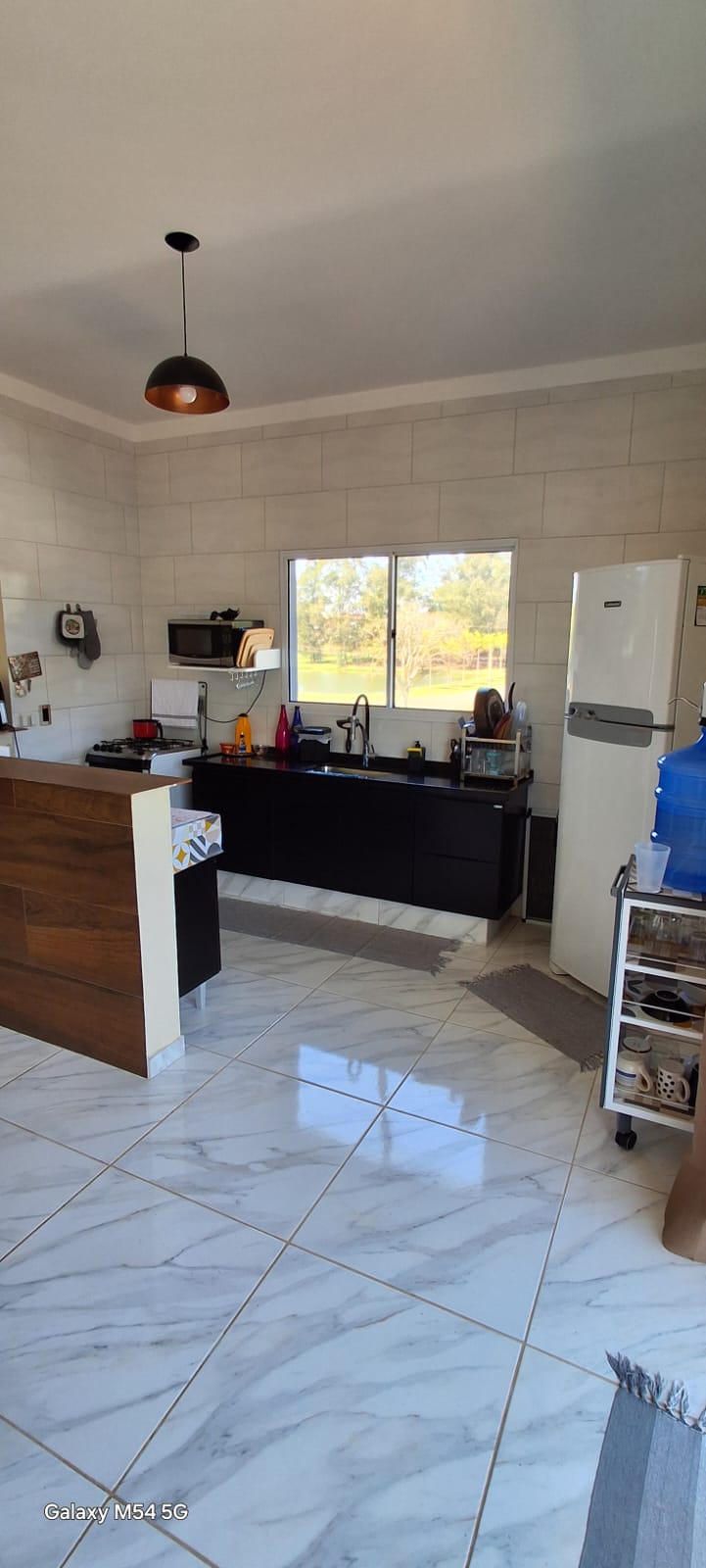 Casa Moderna com Piscina e Suíte Master no Condomínio Ninho Verde I - Porangaba, SP